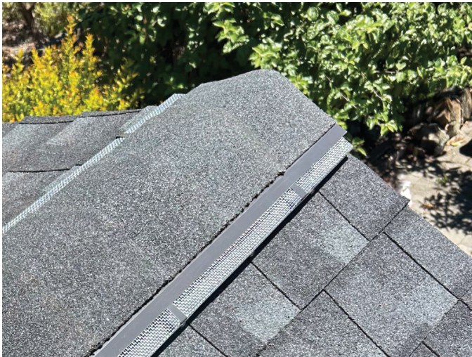 Pitch Perfect Metal Ridge Vent with ridge cap shingle installed